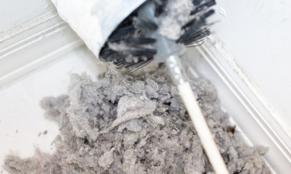 lint coming out of a cleaned dryer vent