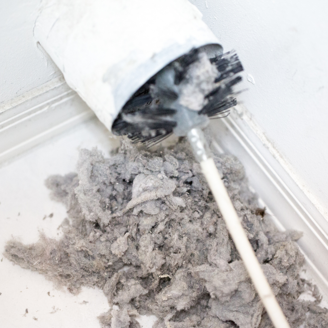 lint coming out of a cleaned dryer vent